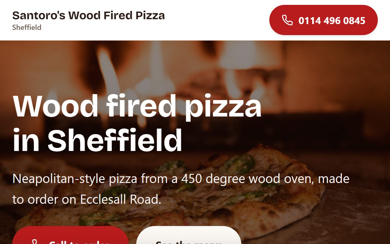 Screenshot of the Santoro's Wood Fired Pizza demo site with a wood oven photo hero